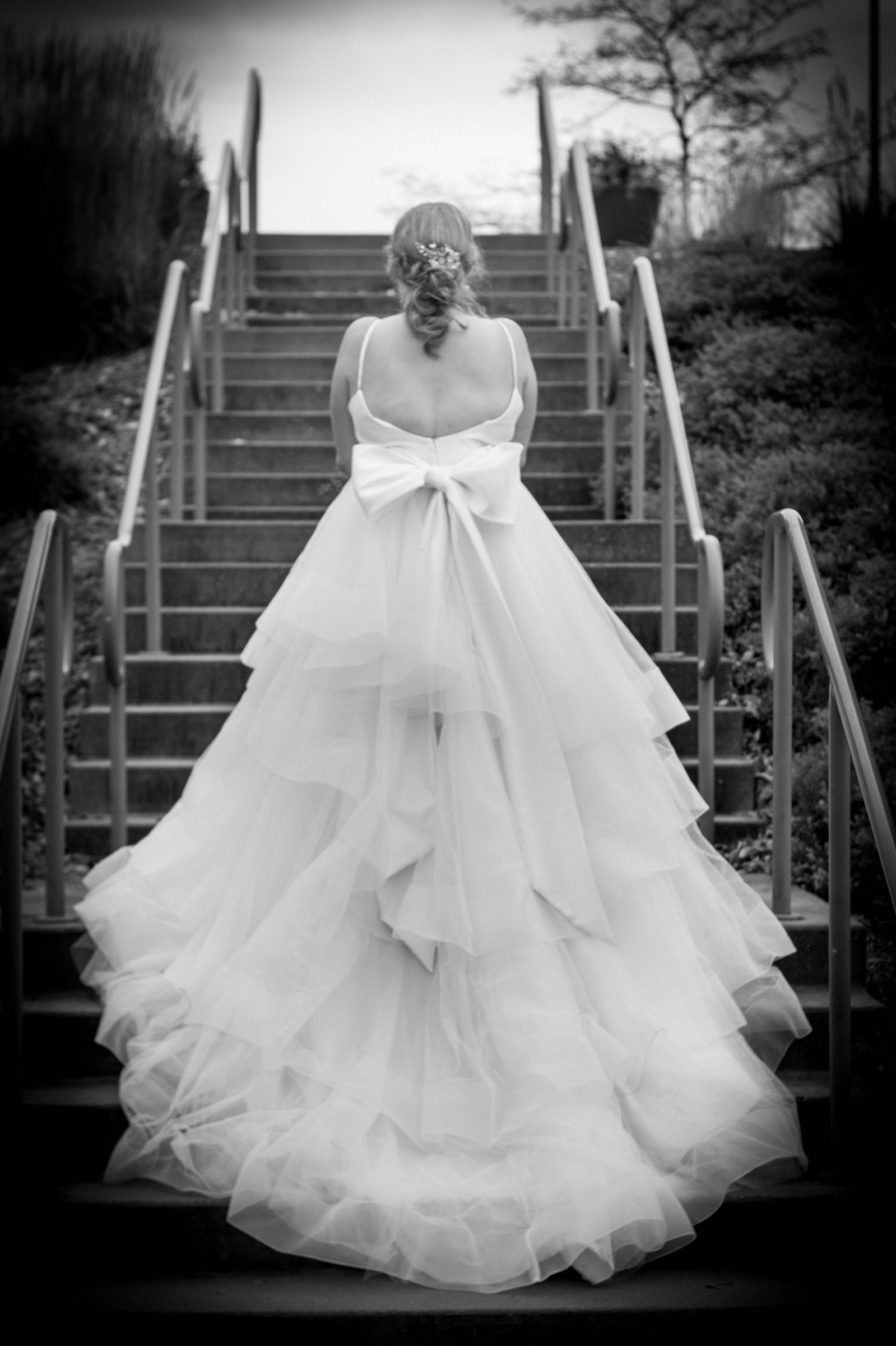 Bride sahowing off her dress, Minneapolis wedding photography