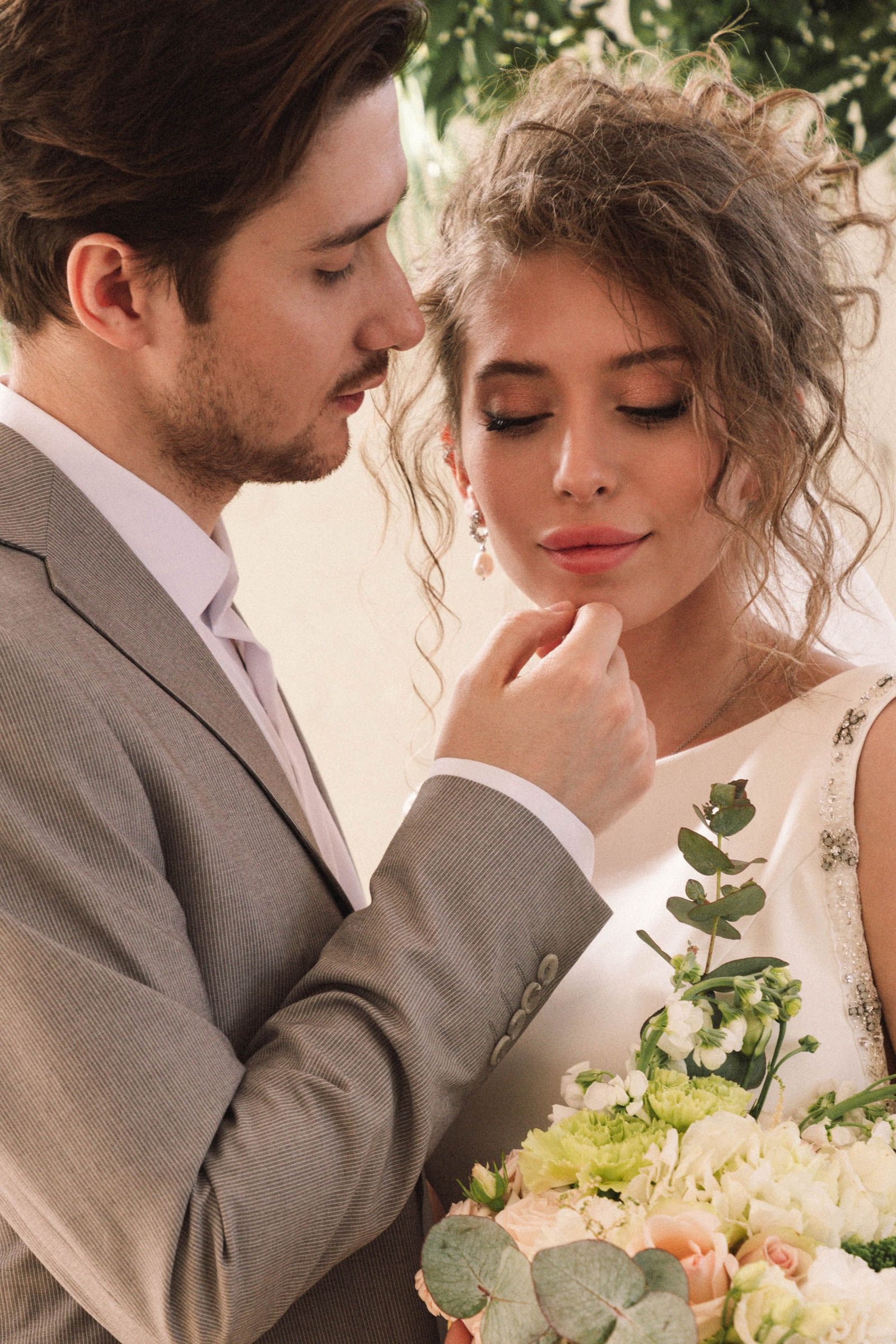Groom coming in for a kiss- Twin Cities documentary wedding photography